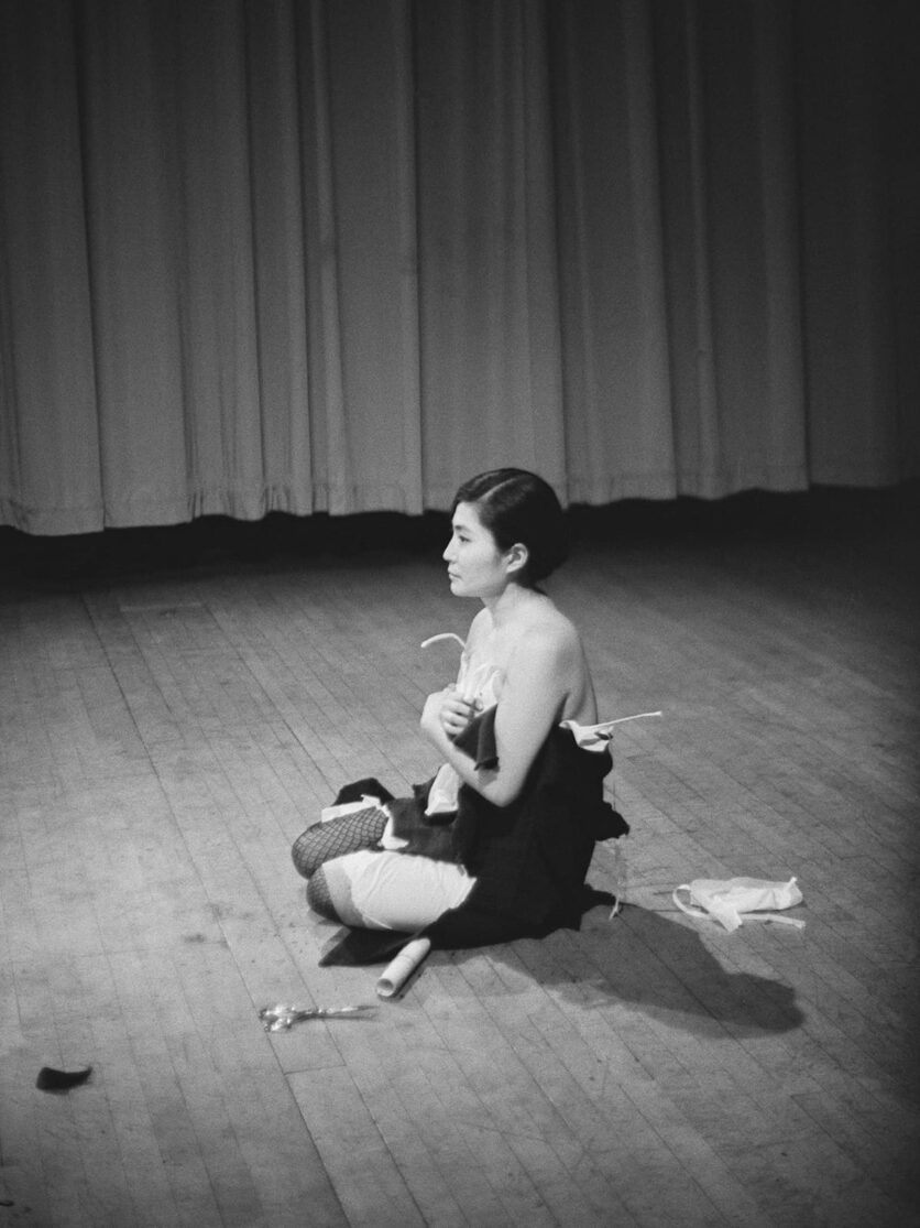 Yoko Ono, Cut Piece 1964. Performed by Yoko Ono in ‘New Works by Yoko Ono’, Carnegie Recital Hall, NYC, March 21 1965. Photo © Minoru Niizuma.